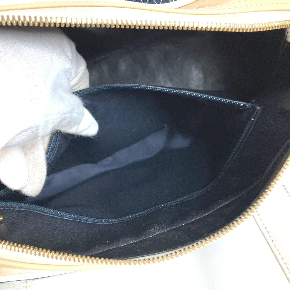 CHANEL กระเป๋าเดินทางกีฬา กระเป๋าทรงบอสตัน CC โลโก้โคโค่ ควิลท์ กระเป๋าถือ กระเป๋าสะพายข้าง ทำจากผ้าแคนวาส เหมาะสำหรับทั้งชายและหญิง สีน้ำเงินเข้ม