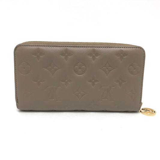 LOUIS VUITTON M81511 モノグラムエンボス ジッピーウォレット ろんぐろんぐラウンドファスナー 長財布 レザー レディース ベージュ系