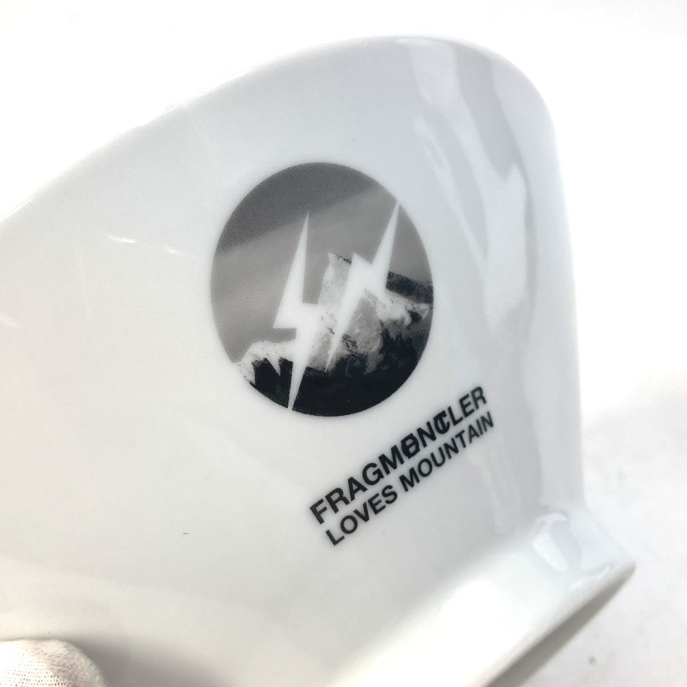 MONCLER x fragmentdesign collaboration ramen bowl and spoon set. This novelty item is not for sale and is perfect as a home décor item. Includes spoon, plate, and other tableware. Ceramic. Men's white.