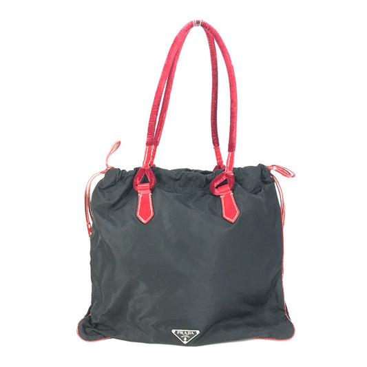 PRADA バイカラー ロゴ 巾着　トライアングルロゴ 三角ロゴ プレート トートバッグ ショルダーバッグ 肩掛け カバン ハンドバッグ エナメル レディース ブラック