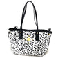 MCM LOVELESS collaboration Dalmatian studded shoulder bag/tote bag in coated leather, available in white and black.