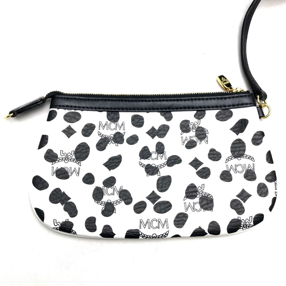 MCM LOVELESS collaboration Dalmatian studded shoulder bag/tote bag in coated leather, available in white and black.