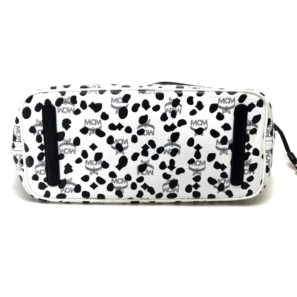 MCM LOVELESS collaboration Dalmatian studded shoulder bag/tote bag in coated leather, available in white and black.