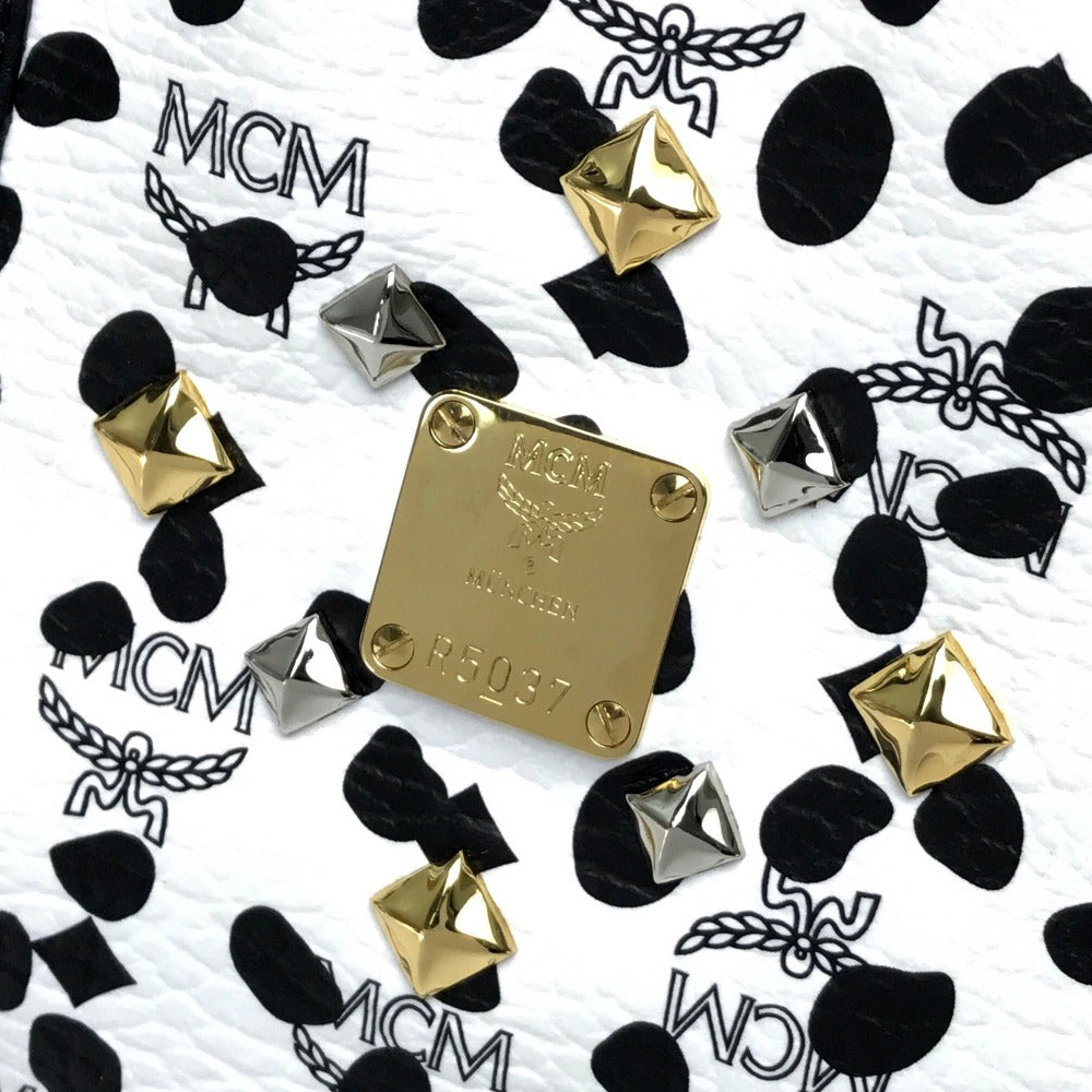 MCM LOVELESS collaboration Dalmatian studded shoulder bag/tote bag in coated leather, available in white and black.