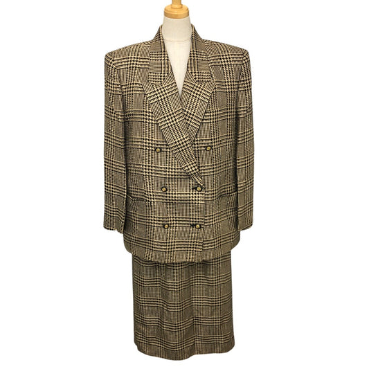 Burberrys Overall handle Suit set (jacket and skirt) with double-breasted jacket and skirt in a houndstooth pattern. Apparel. setup cotton Brown Used