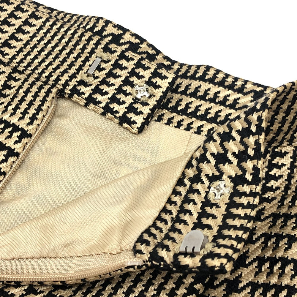 Burberrys Overall handle Suit set (jacket and skirt) with double-breasted jacket and skirt in a houndstooth pattern. Apparel. setup cotton Brown Used