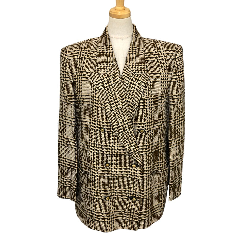 Burberrys Overall handle Suit set (jacket and skirt) with double-breasted jacket and skirt in a houndstooth pattern. Apparel. setup cotton Brown Used