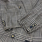 Burberrys Overall handle Suit set (jacket and skirt) with double-breasted jacket and skirt in a houndstooth pattern. Apparel. setup cotton Brown Used