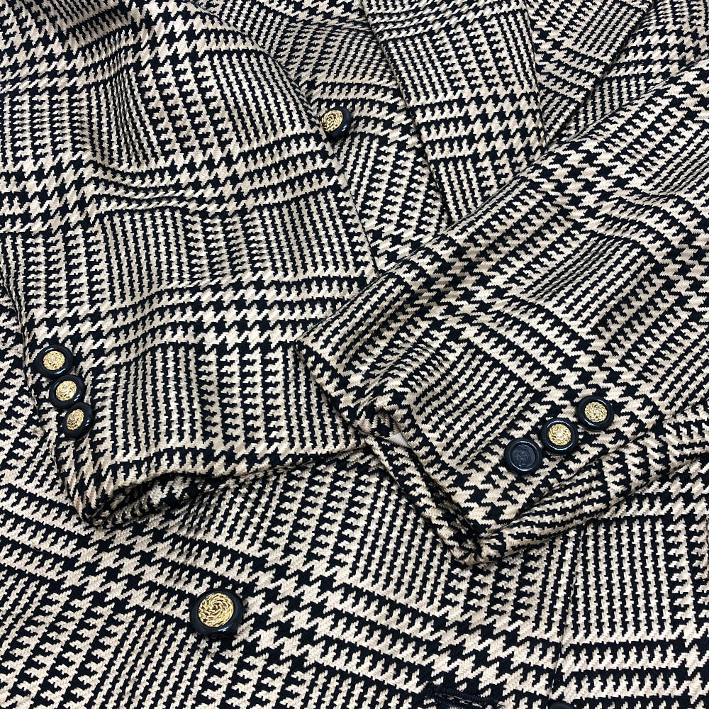 Burberrys Overall handle Suit set (jacket and skirt) with double-breasted jacket and skirt in a houndstooth pattern. Apparel. setup cotton Brown Used