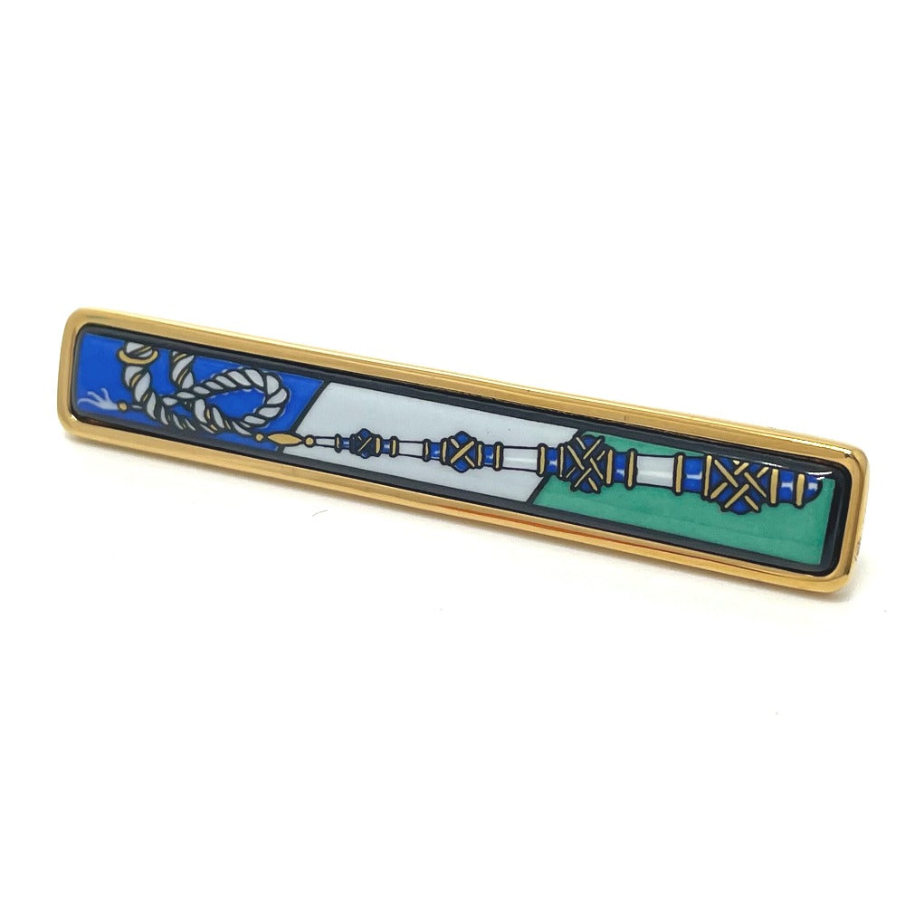 HERMES Takayaki enamel pintuck brooch in gold, metal, for women.