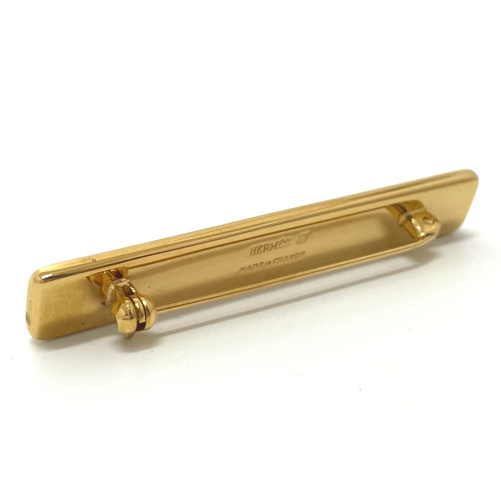 HERMES Takayaki enamel pintuck brooch in gold, metal, for women.