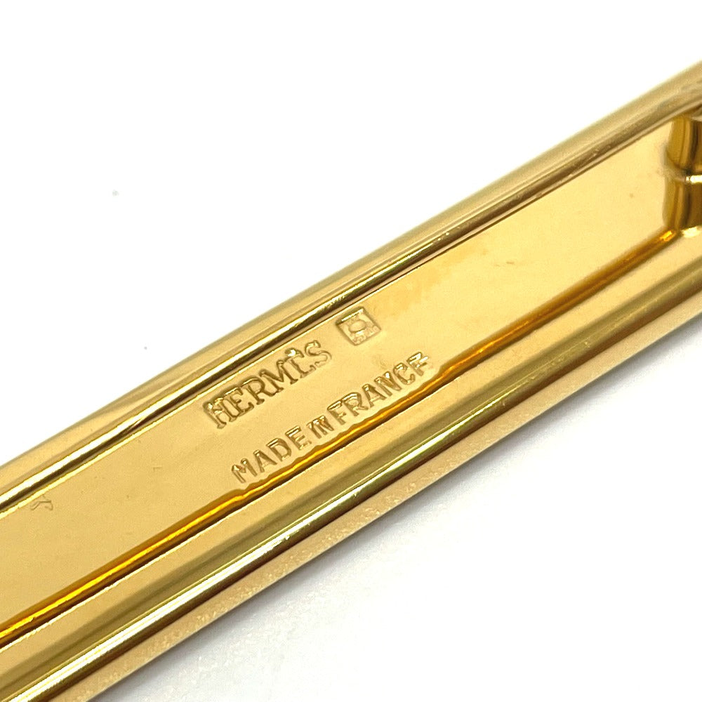 HERMES Takayaki enamel pintuck brooch in gold, metal, for women.