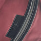 VALENTINO studded triple clutch bag in black leather, tricolor design.