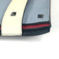 VALENTINO studded triple clutch bag in black leather, tricolor design.