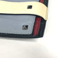 VALENTINO studded triple clutch bag in black leather, tricolor design.