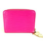 LOUIS VUITTON M14144 Japan-exclusive Epi Leather Zippy Coin Purse by Takashi Murakami. This wallet features a round zipper and is crafted from Epi leather. It's a cute pink design.