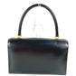 HERMES Vintage Cordriere Flap Handbag in Leather, Unisex, Black