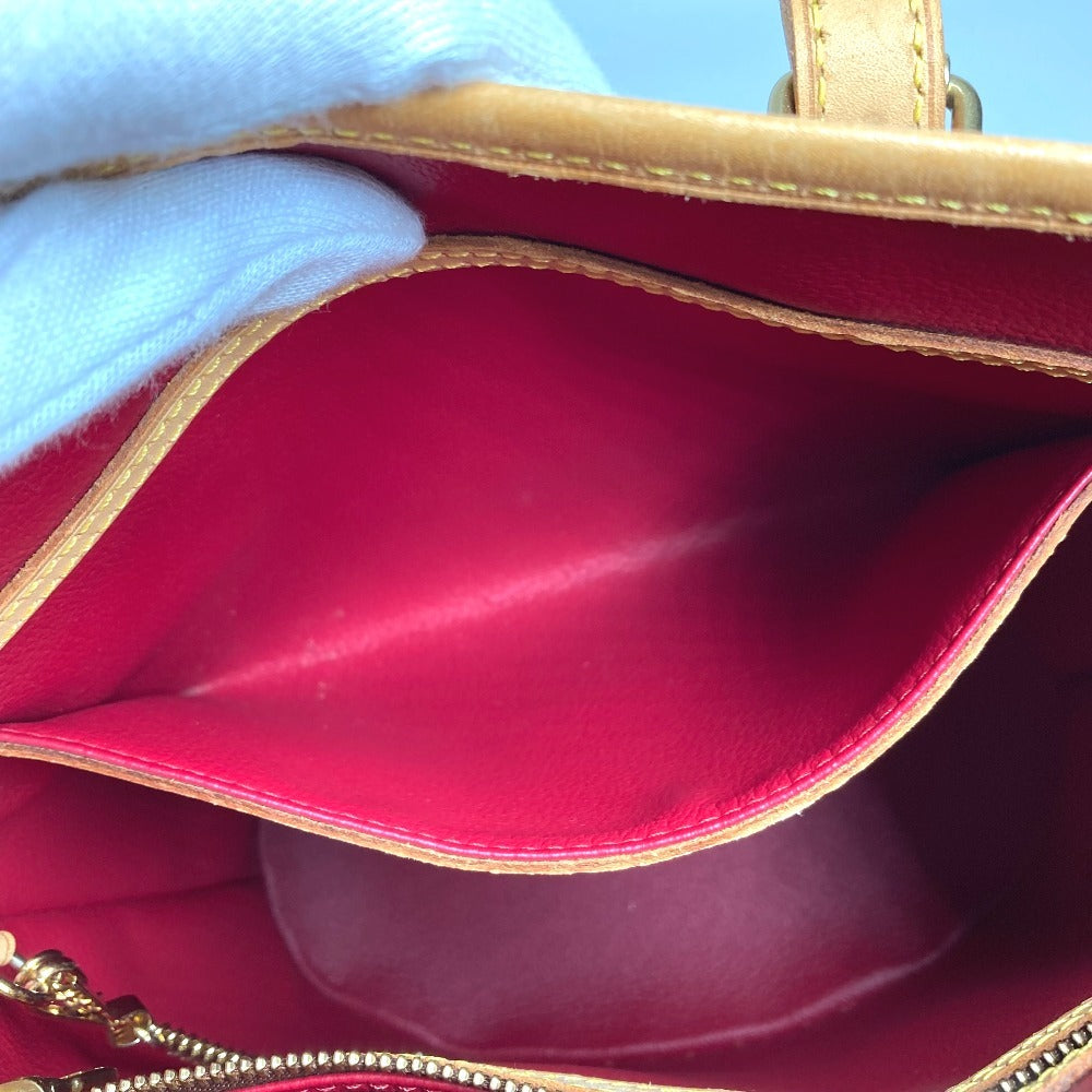 LOUIS VUITTON M95012 Monogram Cherry Bucket PM by Takashi Murakami. This shoulder bag features a Monogram Cherry canvas design and is available in red.