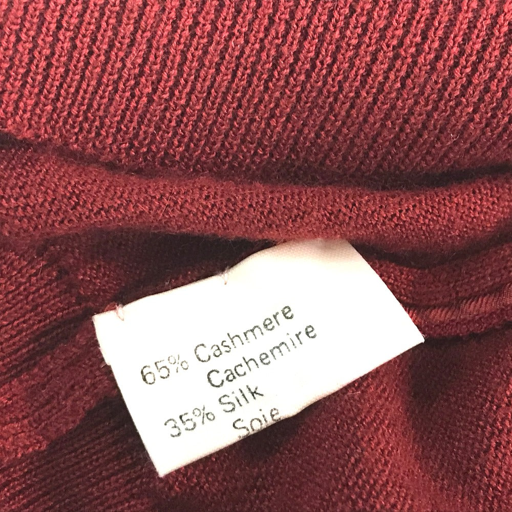 HERMES all-over print hooded knit top with silk accents, cashmere, and a cashmere-blend jacket. Available in red and yellow.