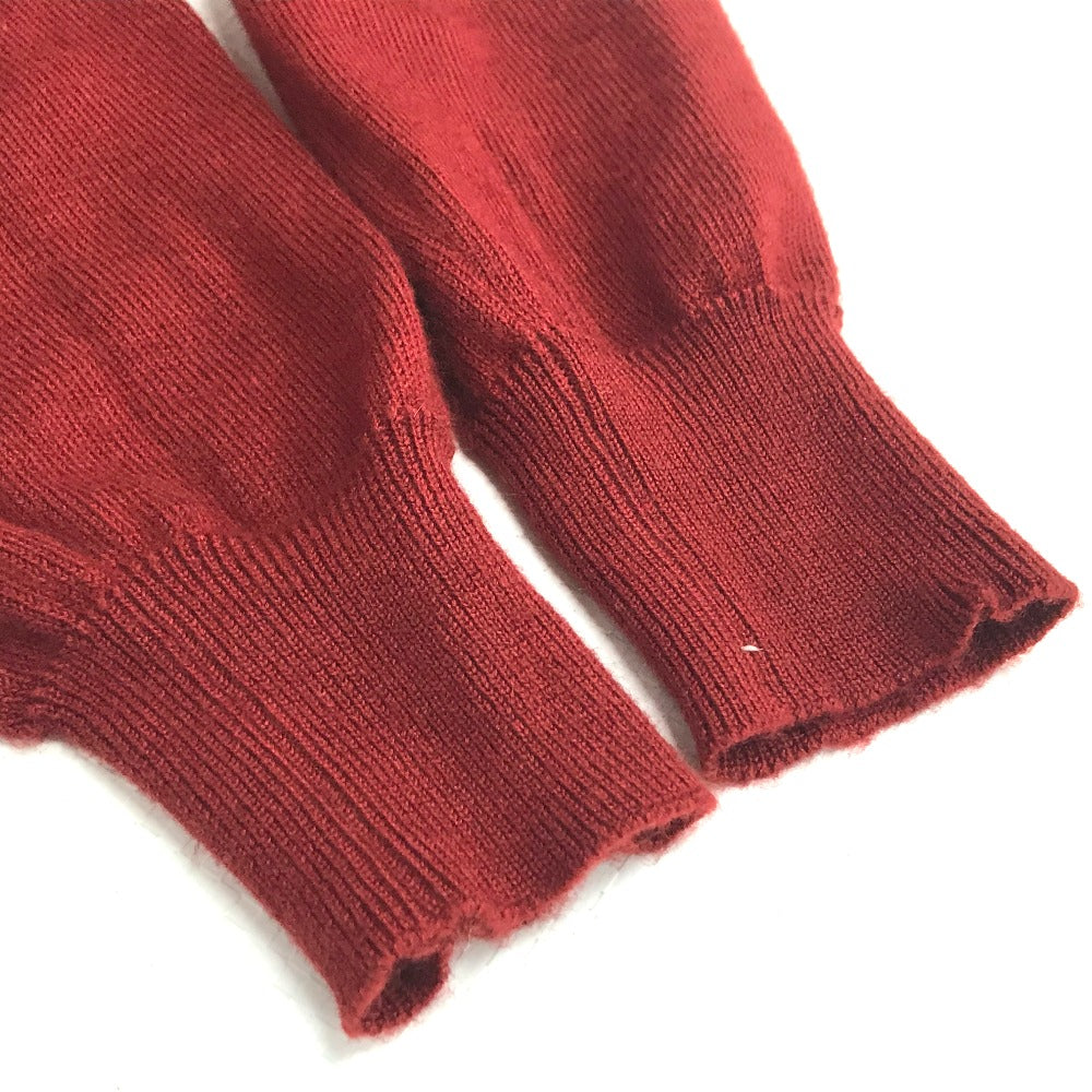 HERMES all-over print hooded knit top with silk accents, cashmere, and a cashmere-blend jacket. Available in red and yellow.