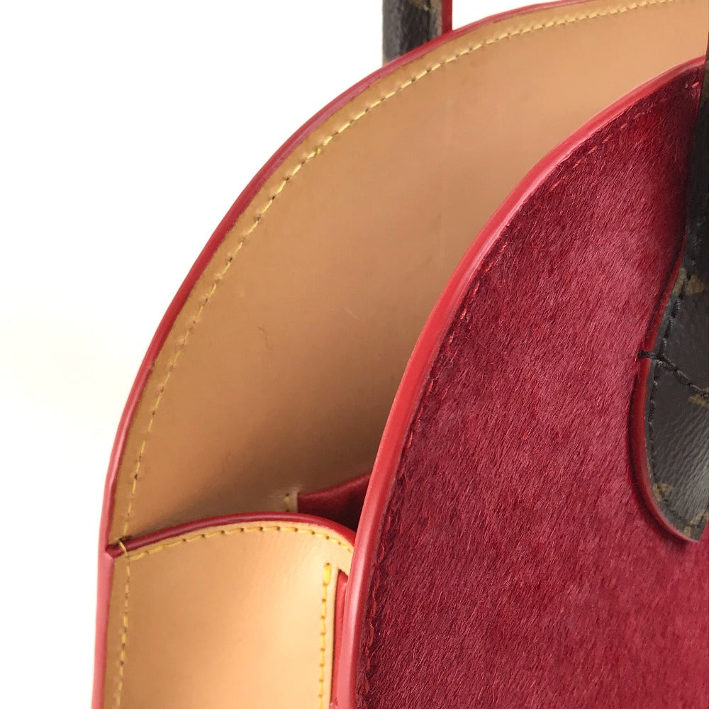 LOUIS VUITTON M41234 Monogram Studded Iconoclast Christian Louboutin Collaboration Handbag in Monogram Canvas/Pony Leather, Brown and Red
