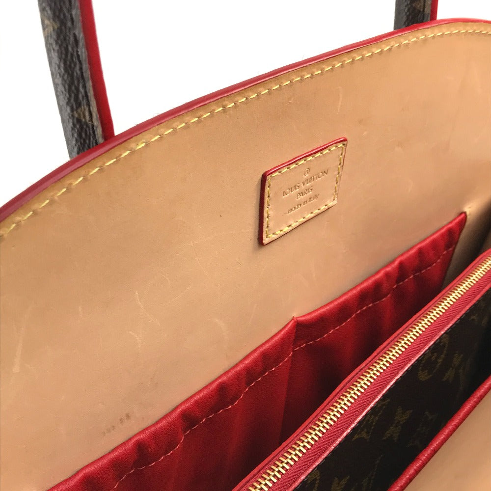 LOUIS VUITTON M41234 Monogram Studded Iconoclast Christian Louboutin Collaboration Handbag in Monogram Canvas/Pony Leather, Brown and Red