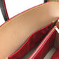 LOUIS VUITTON M41234 Monogram Studded Iconoclast Christian Louboutin Collaboration Handbag in Monogram Canvas/Pony Leather, Brown and Red