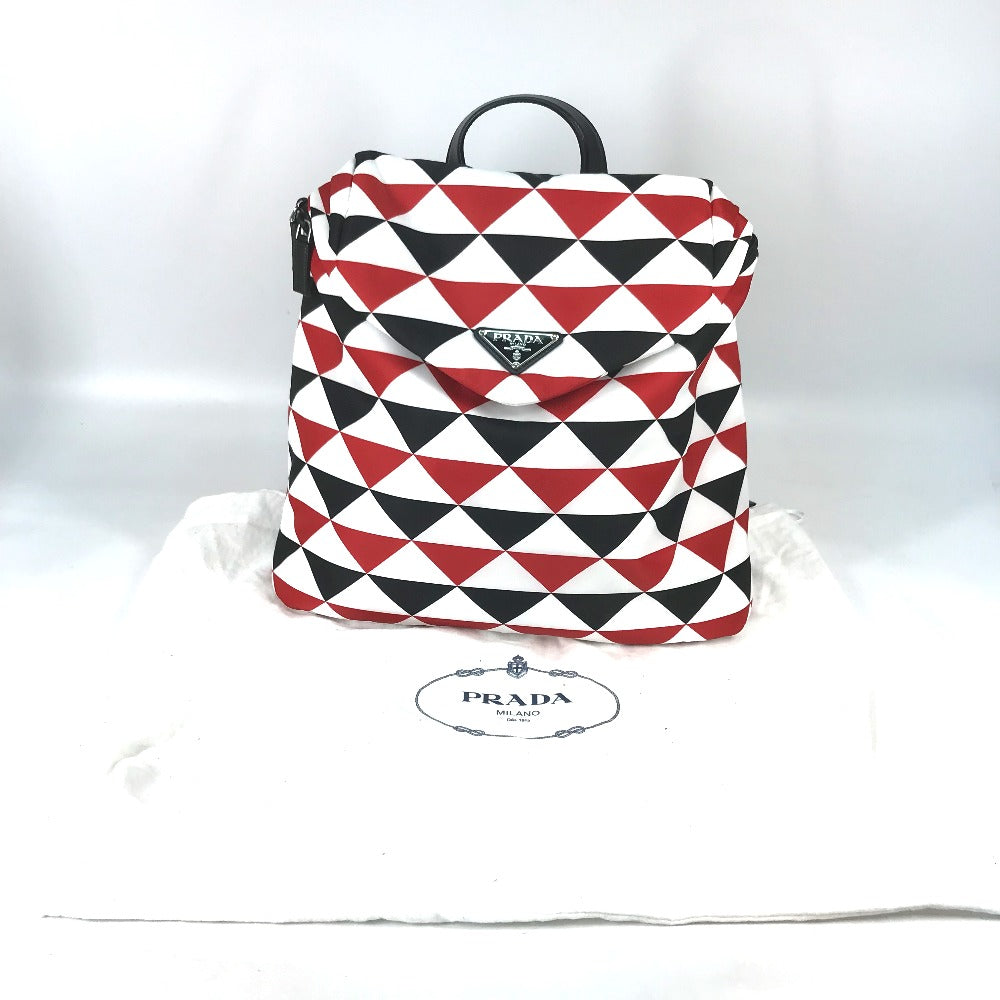 PRADA トライアングルロゴ 三角ロゴ プレート シニョ―プリント バックパック カバン リュックサック ナイロン メンズ レッド