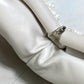 BOTTEGA VENETA 585852 Mini The Pouch, a crossbody bag with a clasp closure, in nylon and leather, white.