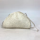 BOTTEGA VENETA 585852 Mini The Pouch, a crossbody bag with a clasp closure, in nylon and leather, white.