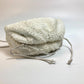 BOTTEGA VENETA 585852 Mini The Pouch, a crossbody bag with a clasp closure, in nylon and leather, white.