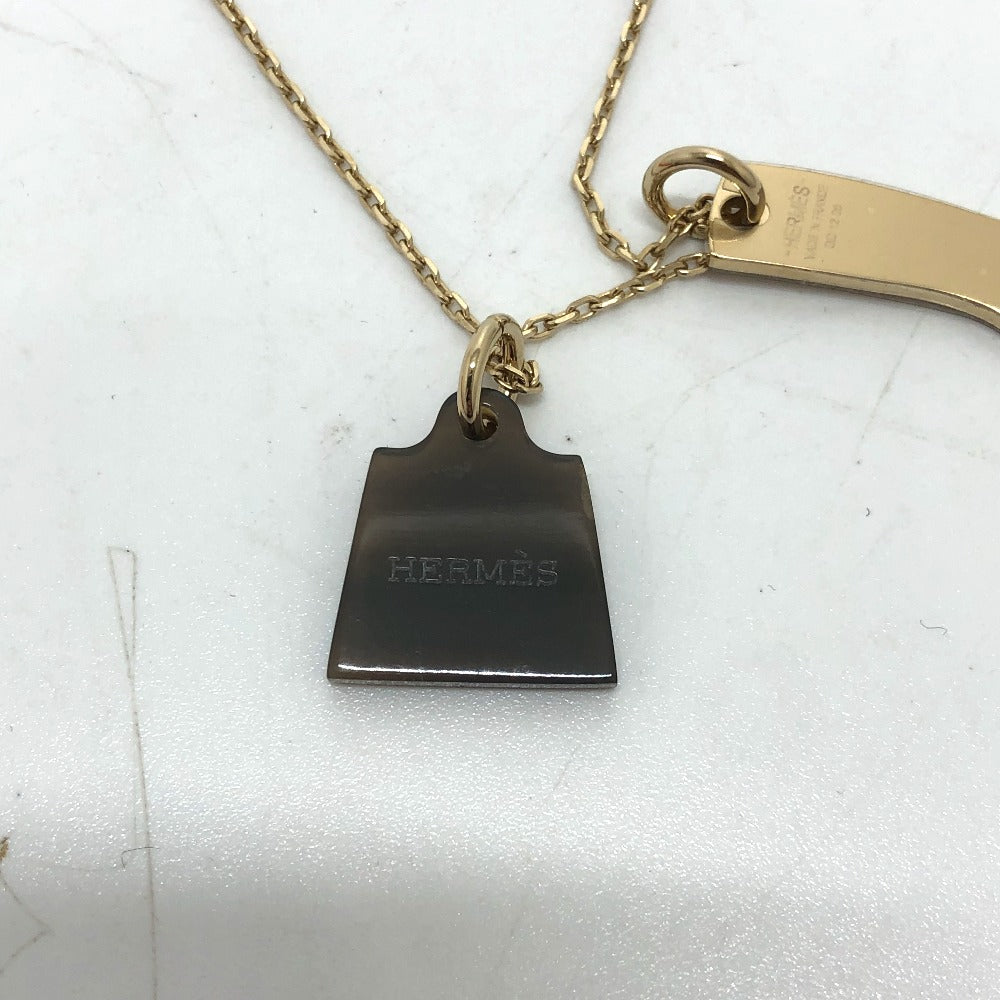 HERMES Amulet Maroquinier PM Buffalo Horn Necklace in Gold for Women