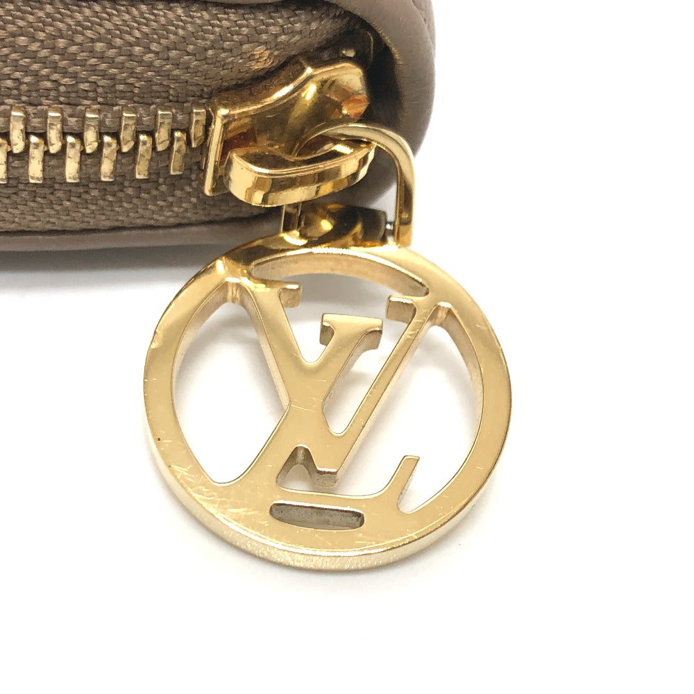 LOUIS VUITTON M81511 モノグラムエンボス ジッピーウォレット ろんぐろんぐラウンドファスナー 長財布 レザー レディース ベージュ系