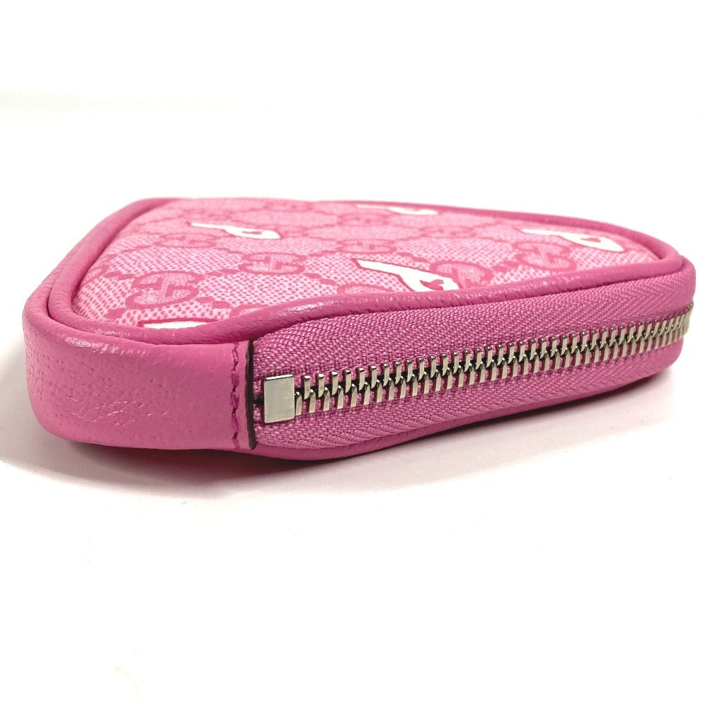 GUCCI Palace GG Supreme logo wallet with zip-around closure, coin purse, and multi-purpose pouch in GG Supreme canvas. Unisex, pink. 723144
