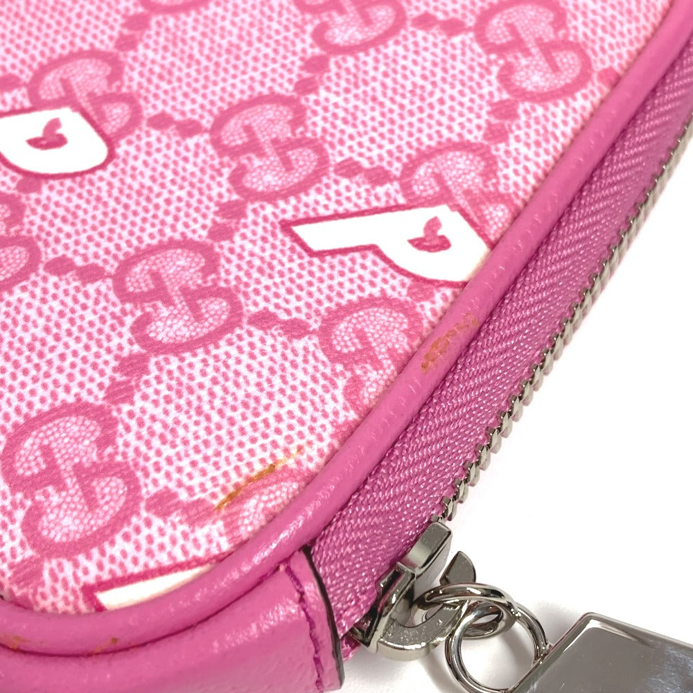 GUCCI Palace GG Supreme logo wallet with zip-around closure, coin purse, and multi-purpose pouch in GG Supreme canvas. Unisex, pink. 723144
