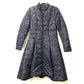 MONCLER EBONY GIUBBOTTO EBONY JACKET, featuring a metal logo and all-over print. This long-sleeved polyester down jacket is perfect for women and features a navy blue interior.