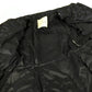 MONCLER EBONY GIUBBOTTO EBONY JACKET, featuring a metal logo and all-over print. This long-sleeved polyester down jacket is perfect for women and features a navy blue interior.