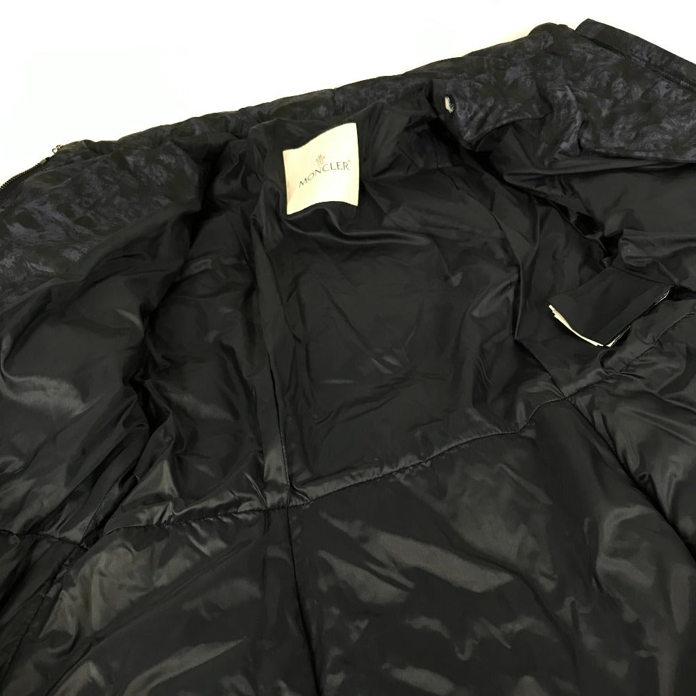 MONCLER EBONY GIUBBOTTO EBONY JACKET, featuring a metal logo and all-over print. This long-sleeved polyester down jacket is perfect for women and features a navy blue interior.