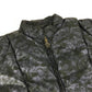 MONCLER EBONY GIUBBOTTO EBONY JACKET, featuring a metal logo and all-over print. This long-sleeved polyester down jacket is perfect for women and features a navy blue interior.