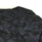MONCLER EBONY GIUBBOTTO EBONY JACKET, featuring a metal logo and all-over print. This long-sleeved polyester down jacket is perfect for women and features a navy blue interior.