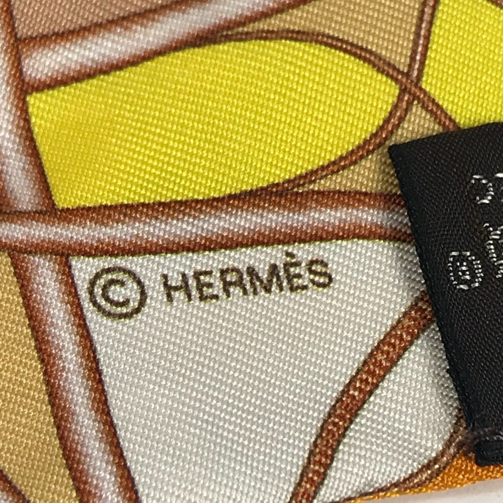 HERMES Horse Print Twilly Silk Scarf for Women in Orange