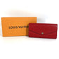 LOUIS VUITTON M61181 Monogram Empreinte Portefeuille Sarah กระเป๋าสตางค์ใบยาวแบบพับ กระเป๋าสตางค์ Monogram Empreinte Leather สำหรับทุกเพศ สีแดง