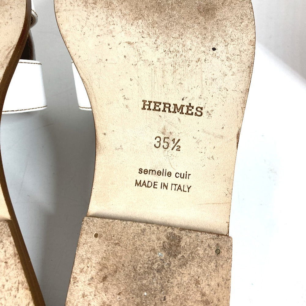 HERMES Oran H-Logo รองเท้าแตะแฟลตหนังสีขาวสำหรับผู้หญิง