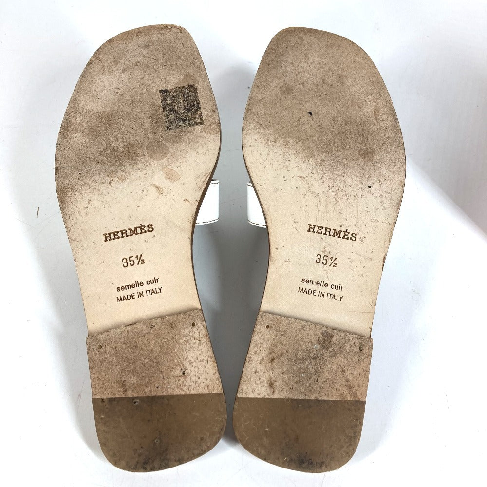 HERMES Oran H-Logo รองเท้าแตะแฟลตหนังสีขาวสำหรับผู้หญิง