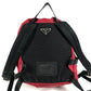 PRADA กระเป๋าเป้สะพายหลังโลโก้สามเหลี่ยมทูโทน กระเป๋าเป้สะพายหลังผ้าไนลอน unisex สีแดง