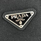 PRADA กระเป๋าเป้สะพายหลังโลโก้สามเหลี่ยมทูโทน กระเป๋าเป้สะพายหลังผ้าไนลอน unisex สีแดง