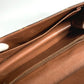 LOUIS VUITTON M51810 Monogram Pochette Dame GM. This unisex Monogram canvas Pochette Dame GM clutch bag is perfect as a pouch or second bag. It's brown and unisex.