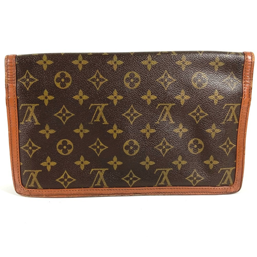 LOUIS VUITTON M51810 Monogram Pochette Dame GM. This unisex Monogram canvas Pochette Dame GM clutch bag is perfect as a pouch or second bag. It's brown and unisex.