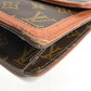 LOUIS VUITTON M51810 Monogram Pochette Dame GM. This unisex Monogram canvas Pochette Dame GM clutch bag is perfect as a pouch or second bag. It's brown and unisex.