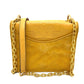Tory Burch logo chain shoulder bag in lambskin, yellow.